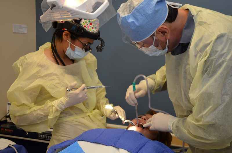 Do prosthodontists perform surgery