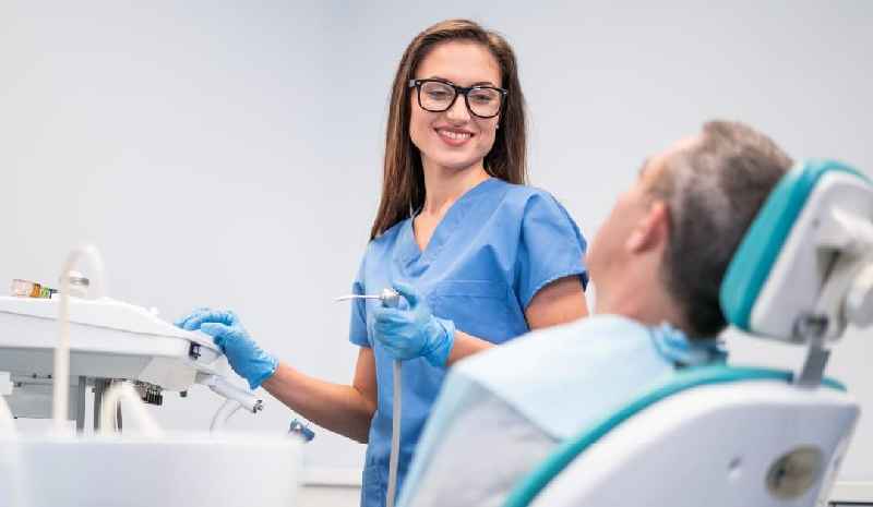 How can an international dentist become a dental hygienist