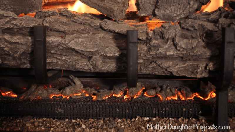 How do I make my fireplace fire burn hotter
