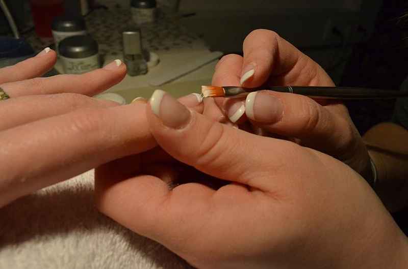 How do nail salons attract customers