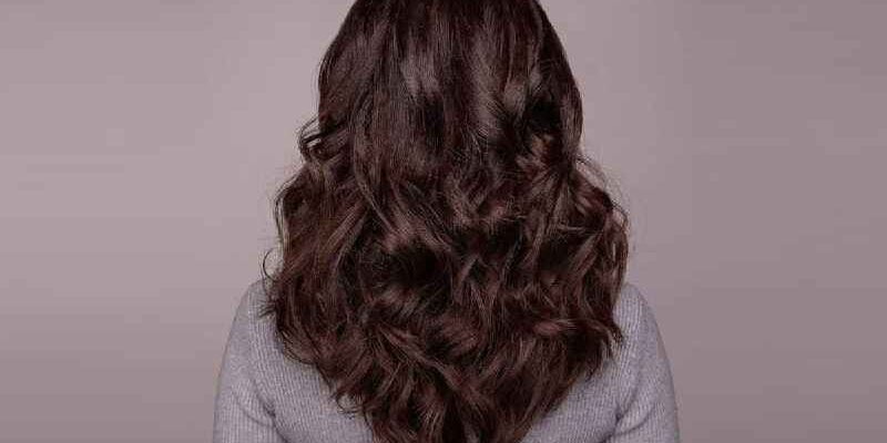 How do you keep thick wavy hair from frizzing