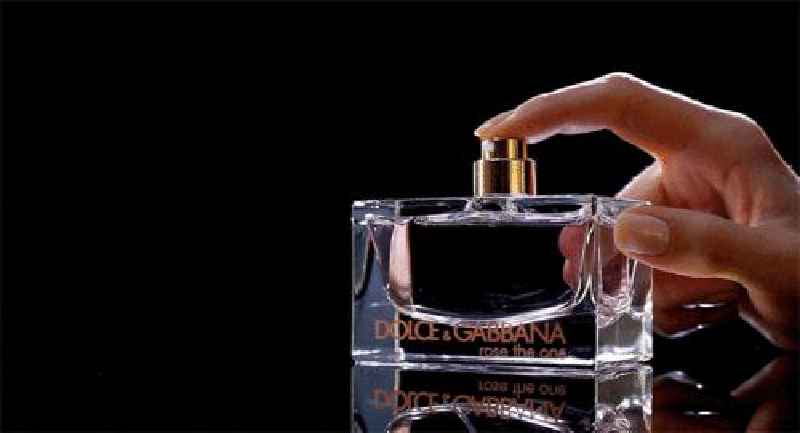 How do you properly spray perfume