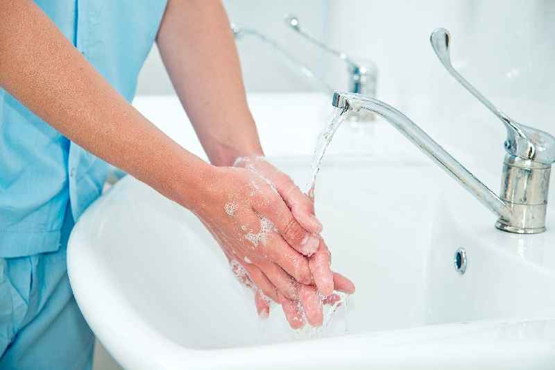 How is hand hygiene compliance measured
