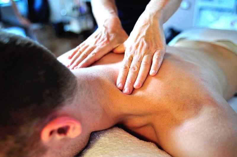 How many licensed massage therapists are there in the US