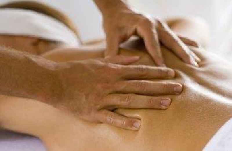How many licensed massage therapists are there in the US