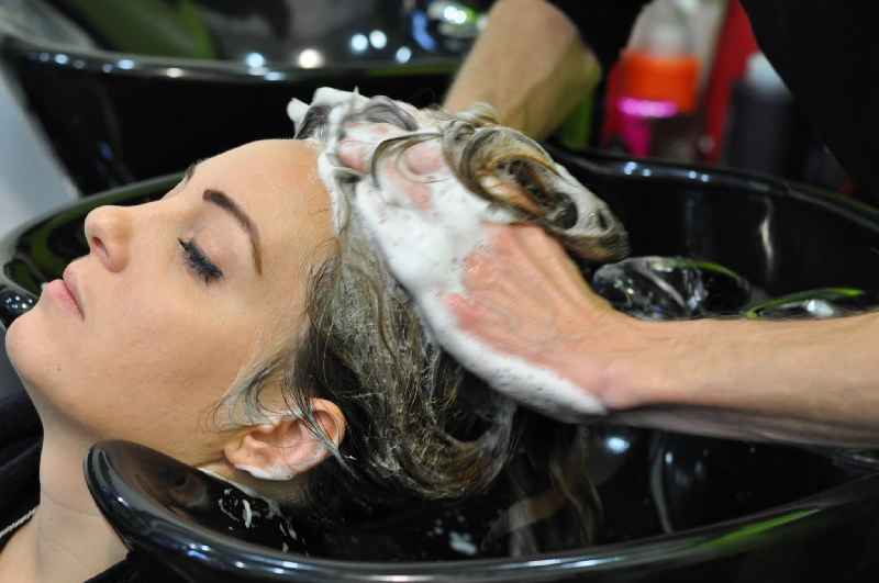 How many times a week should you wash your hair with extensions