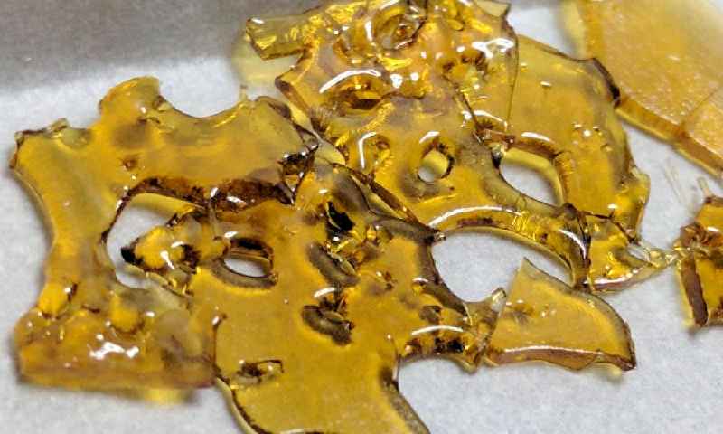 How much oil is 100g of wax
