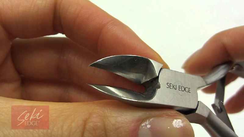 Is an implement used to cut the nail