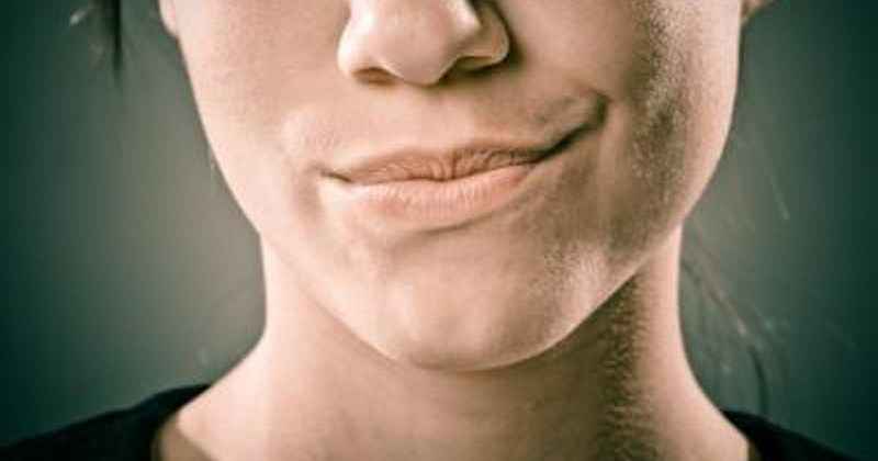 What causes hair on chin in females