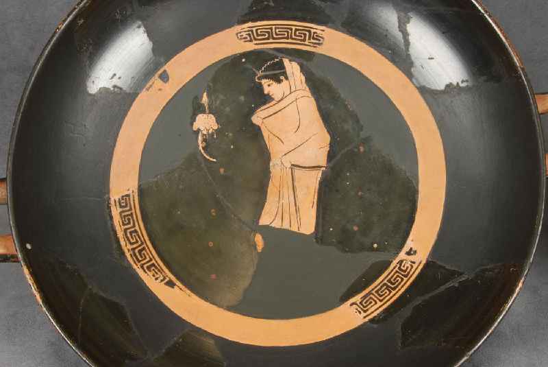 What distinguishes the red-figure technique of Greek vase painting