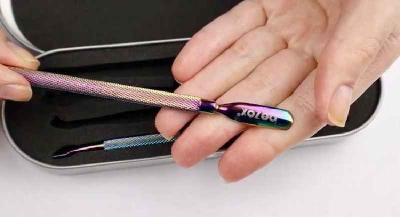 What do we call the tool that is used to push back or loosen the cuticles