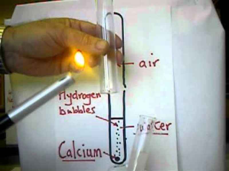 What does calcium carbonate react with