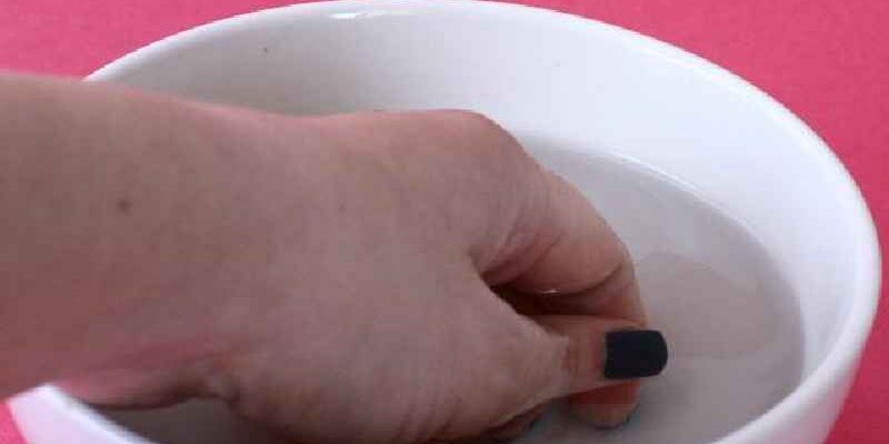 What is the best thing to soak an infected finger in