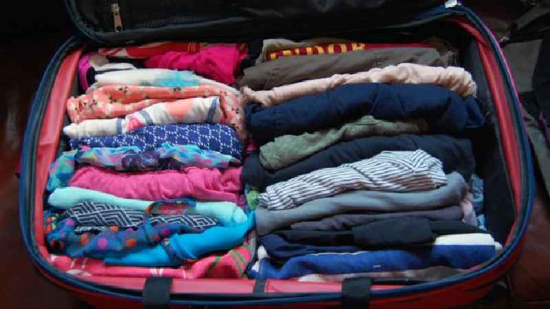 What is the most effective way to pack a suitcase