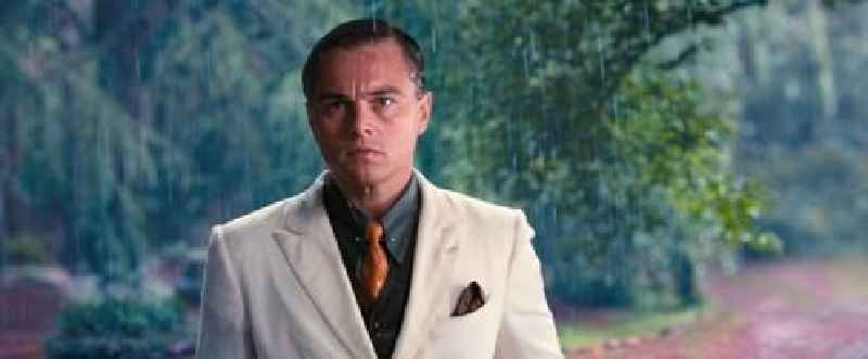 What is the symbolism of the weather in The Great Gatsby