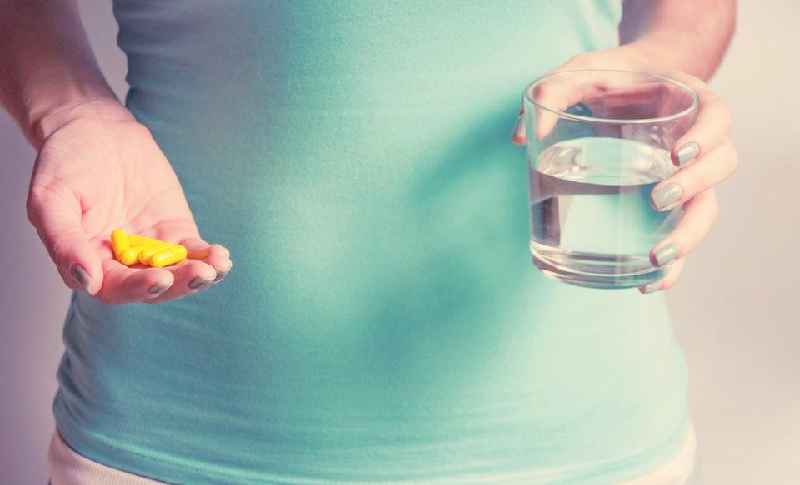 When should I stop taking prenatal vitamins after giving birth