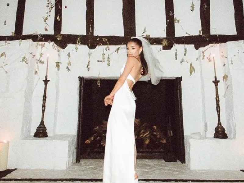 Who designed Ariana Grande's wedding dress